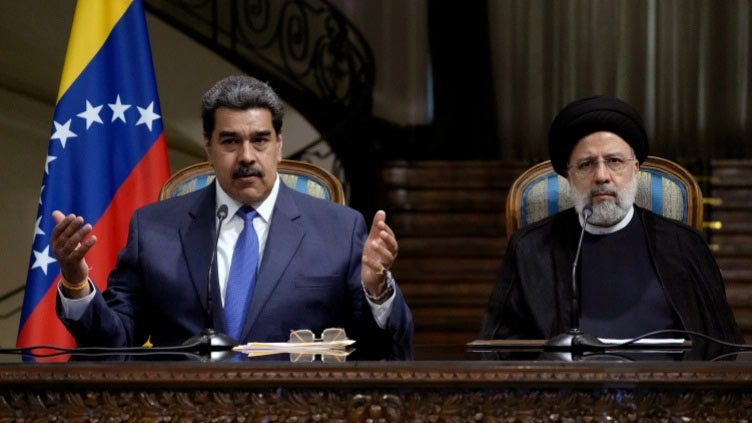 Under U.S. sanctions, Iran and Venezuela sign 20-year cooperation plan
