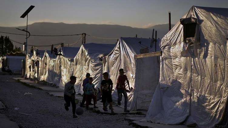 Scores of Syrian refugees head home from crisis-hit Lebanon