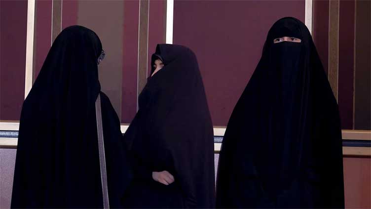Raisi says hijab is the law in Iran as unveiled women face 'yoghurt attack'