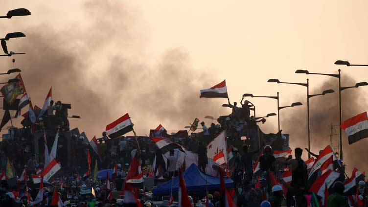 Hundreds protest new proposed election law in Baghdad