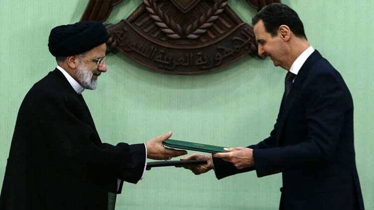 On landmark visit, Iran's Raisi praises Syria 'victory' despite sanctions