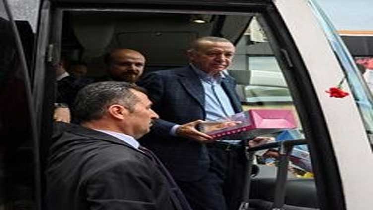 On final day of campaign, Erdogan accuses Turkish opposition of working with Biden